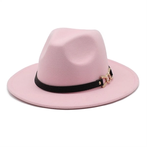 Detail of pink wool fedora with black leather band and gold metal chain buckle