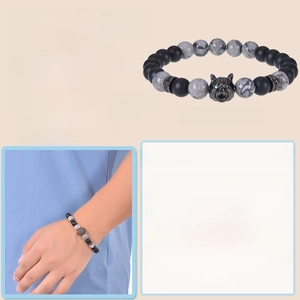 Detailed view of 8mm blue tiger eye beads and wolf head charm with zircon inlay