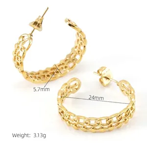 Macro shot showing 24mm diameter and 5.7mm width details of hollow gold hoop earrings