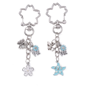 Fashion silver keychain with butterfly, rhinestone flower, and pearl starfish pendants