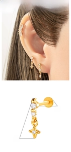 Close-up of gold titanium earring set with star studs and zircon chain dangle details
