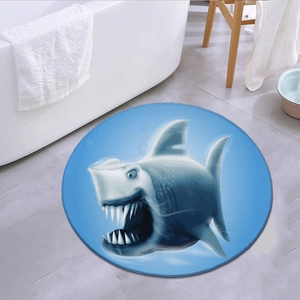 Detail van ronde antislip badmat met blauw cartoon haaienpatroon op vezeloppervlak