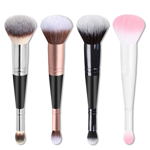 Detailed view of dual-ended makeup brushes in silver, rose gold, black and white finishes