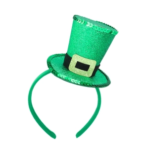 Detail of St. Patrick's Day green glitter mini hat headband with gold buckle and sequins