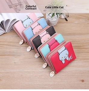 Close-up of colorful cat print wallets with zipper and decorative pendants
