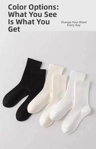 Three-pack cotton crew socks in black, beige, and white shown in a neat tiered layout
