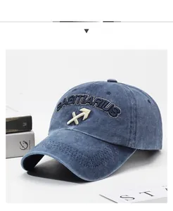 Close-up of Sagittarius 3D embroidery on washed blue cotton denim baseball cap