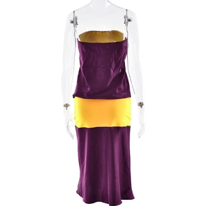 Back view of a purple and yellow spliced strapless maxi dress with a glossy finish