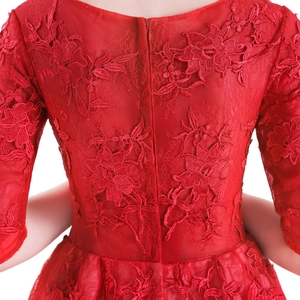 Short red lace evening dress featuring floral embroidery and a back zipper closure