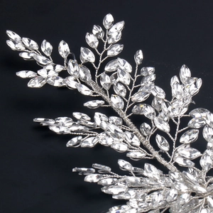 Detail of silver wire bridal hairband with sparkling teardrop crystal leaf patterns
