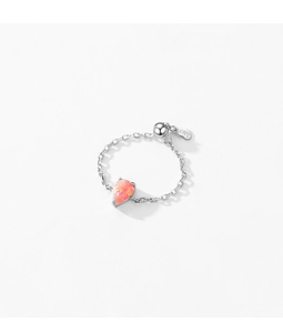 Detailed shot of an adjustable S925 silver chain ring with a pink teardrop opal stone