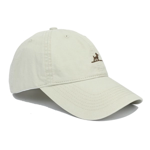 Detail of soft cream baseball cap showing brown dog embroidery and cotton twill texture