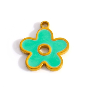 Detailed view of mint green enamel flower pendant with gold plating and hanging loop