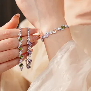 Elegant geometric S-shaped tennis bracelet with colorful zircons and silver finish