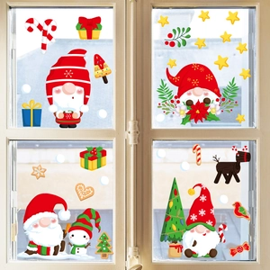 Christmas static window clings set featuring Santa Claus and reindeer on glass pane