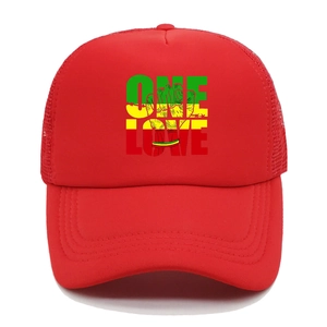 Close-up of One Love print and red mesh texture on breathable trucker baseball cap
