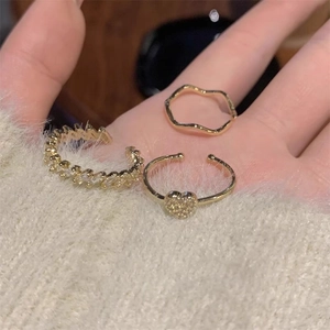 Detailed view of 18K gold plated heart ring set with sparkling zircon stones