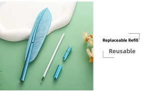 Detailed view of detachable metal feather pen with refillable ink cartridge system