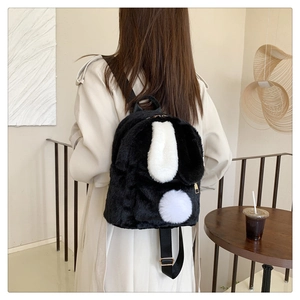 Furry panda backpack with cute ears on model back in minimalist studio setting
