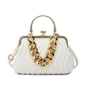 White ruched evening handbag with gold circular handles and metallic chain strap