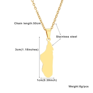 Detail view of gold Madagascar map pendant with size specs and stainless steel material