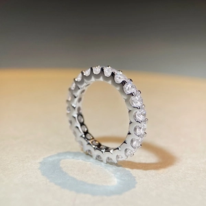 Elegance S925 sterling silver eternity ring featuring brilliant round moissanite stones