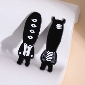 Minimalist black and white enamel pins with abstract anime characters for bags and clothing
