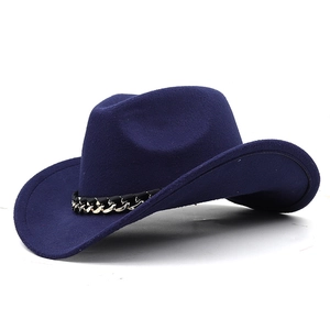 Detail of dark blue wool fedora with woven black band and decorative gold metal chain