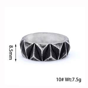 Detail view of vintage Celtic ring showing 8.5mm width and embossed geometric patterns
