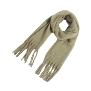 Detail shot of soft beige mohair scarf with tassels showing knit texture and fringe