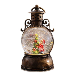 Vintage bronze Christmas lantern snow globe with Santa and sparkling glitter