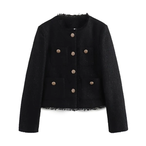 Macro shot of black tweed fabric texture with gold buttons and fringe on jacket