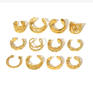Detailed close-up of 12 assorted 18K gold-plated vintage ear cuff set with geometric patterns