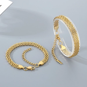 Polished gold woven titanium steel bracelet set featuring adjustable lobster clasp