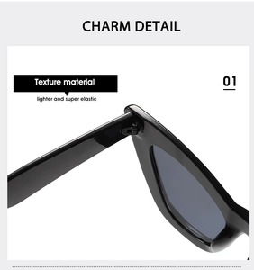 Detailed macro view of black cat-eye sunglasses hinges showing durable texture material