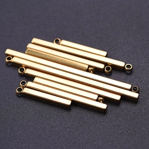 Macro shot of 304 stainless steel golden vertical bar pendants for DIY jewelry design