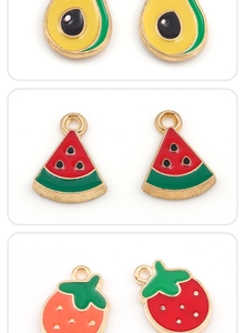 Detailed view of DIY fruit charms including avocado, watermelon, and strawberry styles