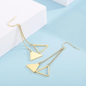 Minimalist gold geometric hollow triangle tassel earrings displayed on a modern background