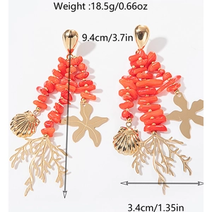 Detail showing dimensions of ocean themed orange coral bead earrings with sea charms
