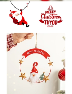 Close-up of a festive iron Christmas gnome hanging ornament with red metal ring and star