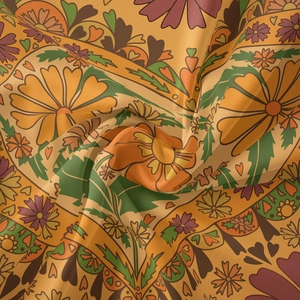 Detailed macro shot of vintage floral tapestry fabric with artistic soft spiral texture