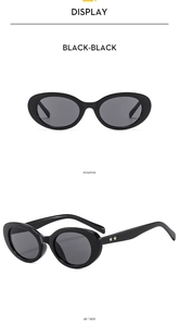 Front and 45-degree side view of oval sunglasses with gold star detail on the temple