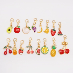Colorful enamel fruit pendants set including strawberry and banana charms with lobster clasps
