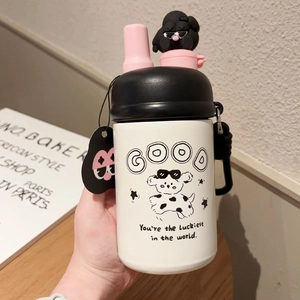 Close-up of cartoon dalmatian puppy pattern and slogan on stainless steel vacuum bottle