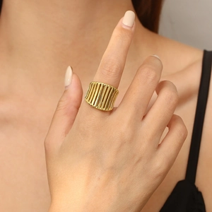 Modern 18K gold-plated stainless steel wide hollow ring shown worn on a model's finger