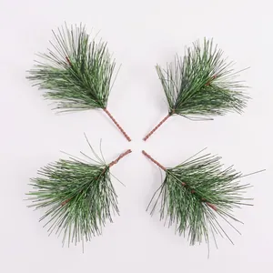 Set of four realistic artificial pine needle branches for Christmas DIY decor on white background