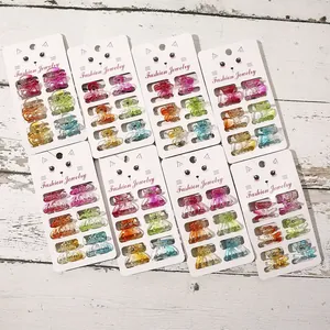Assorted mini colorful transparent plastic hair claw clips in various shapes for girls