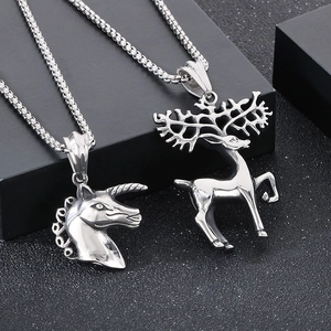 Detailed view of silver unicorn and elk pendant necklaces with sleek metal finishes
