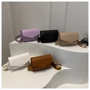 Collection of envelope crossbody bags in purple, black, beige, white and brown leather