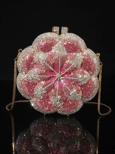Detailed macro view of the sparkling pink and silver rhinestone crystal evening bag